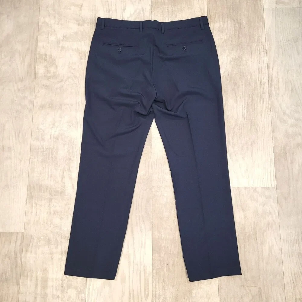 Greg Norman Mens Golf Pants 34x30 (Act 34x29) Blue Stretch Performance Chino